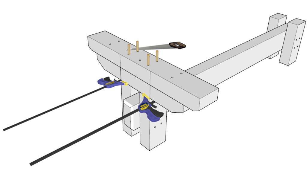 Hammer in dowels into the table base