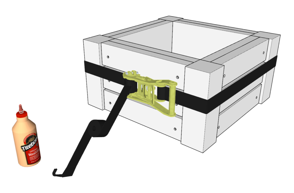 framing the DIY planter box using a ratchet strap