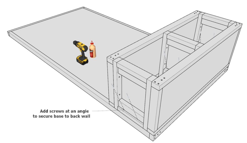 Attaching the DIY mudroom storage cubbies to the back wall