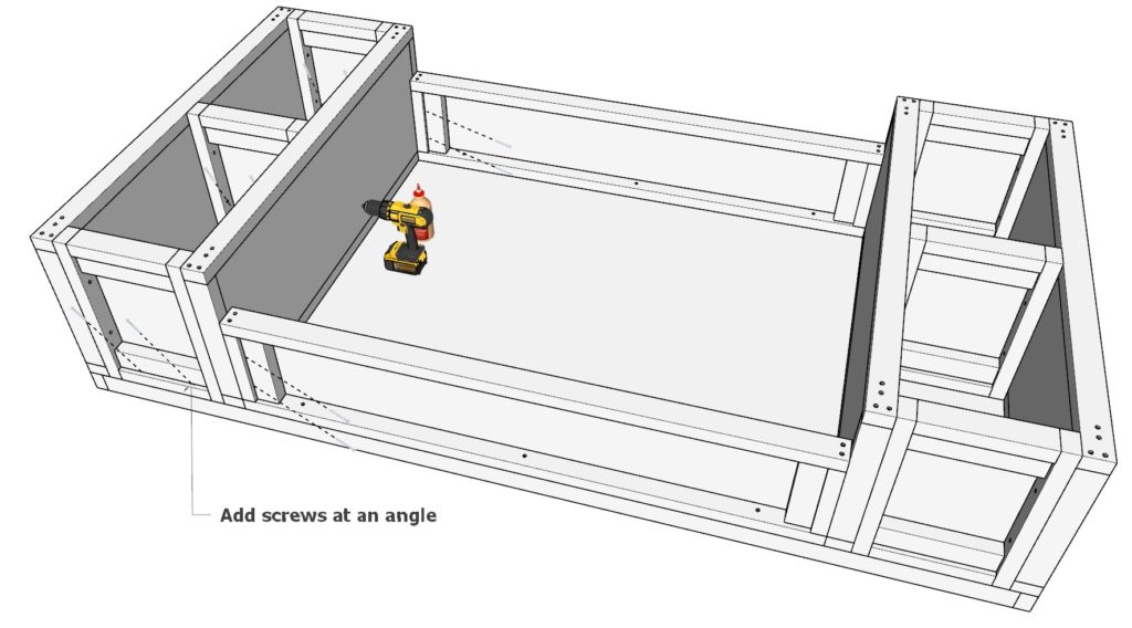 Attaching the DIY mudroom storage cubbies to the back wall