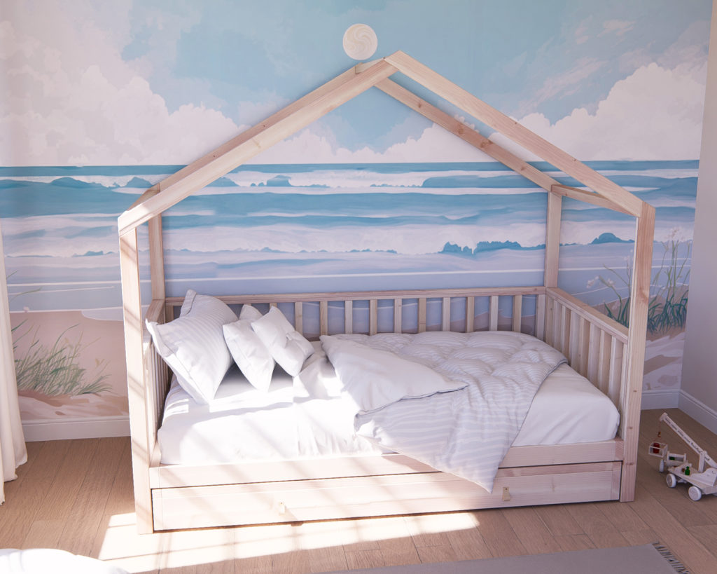 DIY Montessori house bed with wooden frame, storage shelf, and twin mattress in a thoughtfully designed children's room, enhancing learning and independence.
