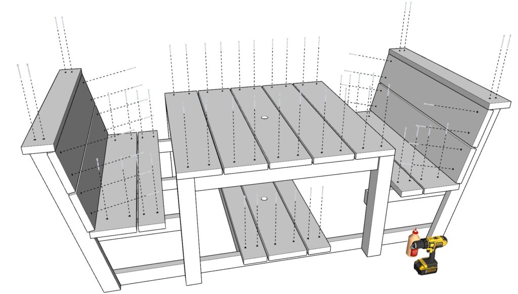 Adding the seating boards and the table top boards to the DIY picnic table