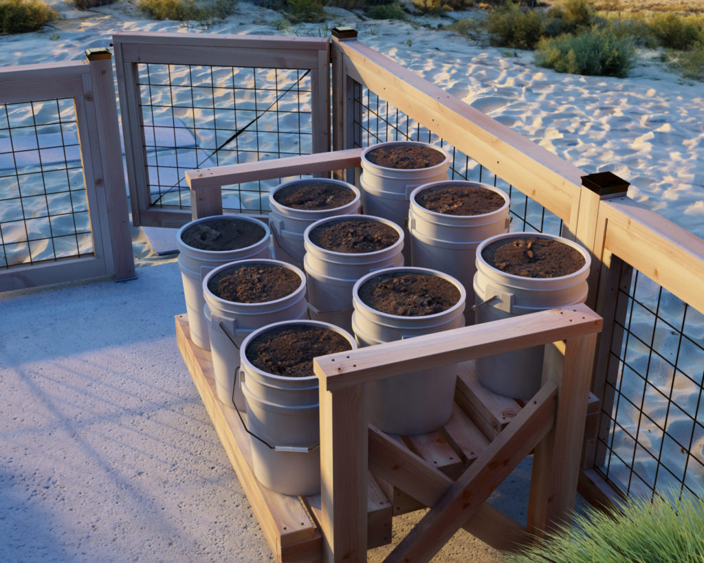 Small 6-bucket garden stand with desert background, perfect for limited space and custom gardening needs.