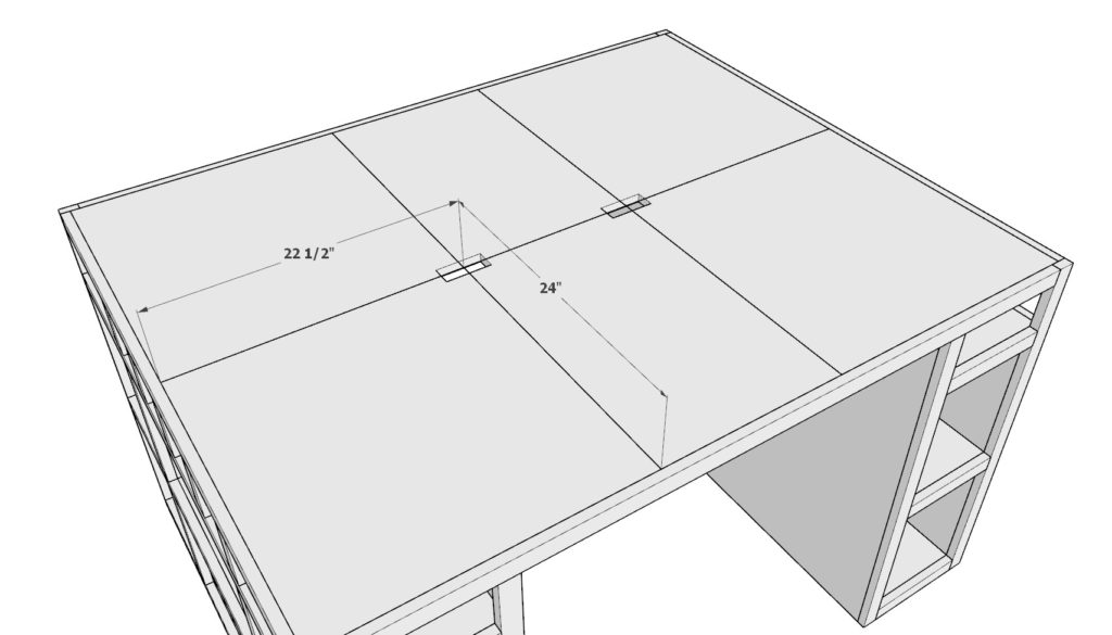 Cutting out the outlet holes in the table top