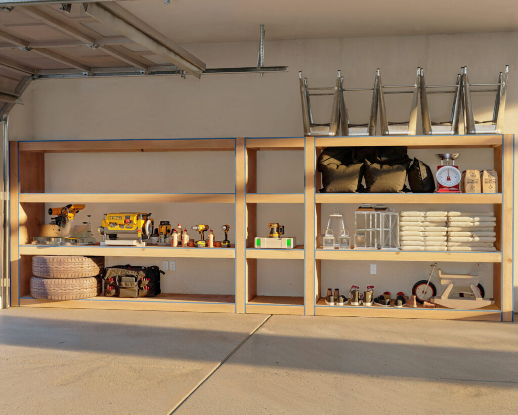 Versatile DIY garage shelf made from 2x4 lumber and plywood, featuring separate storage areas for different sized items, with full casing around each section.