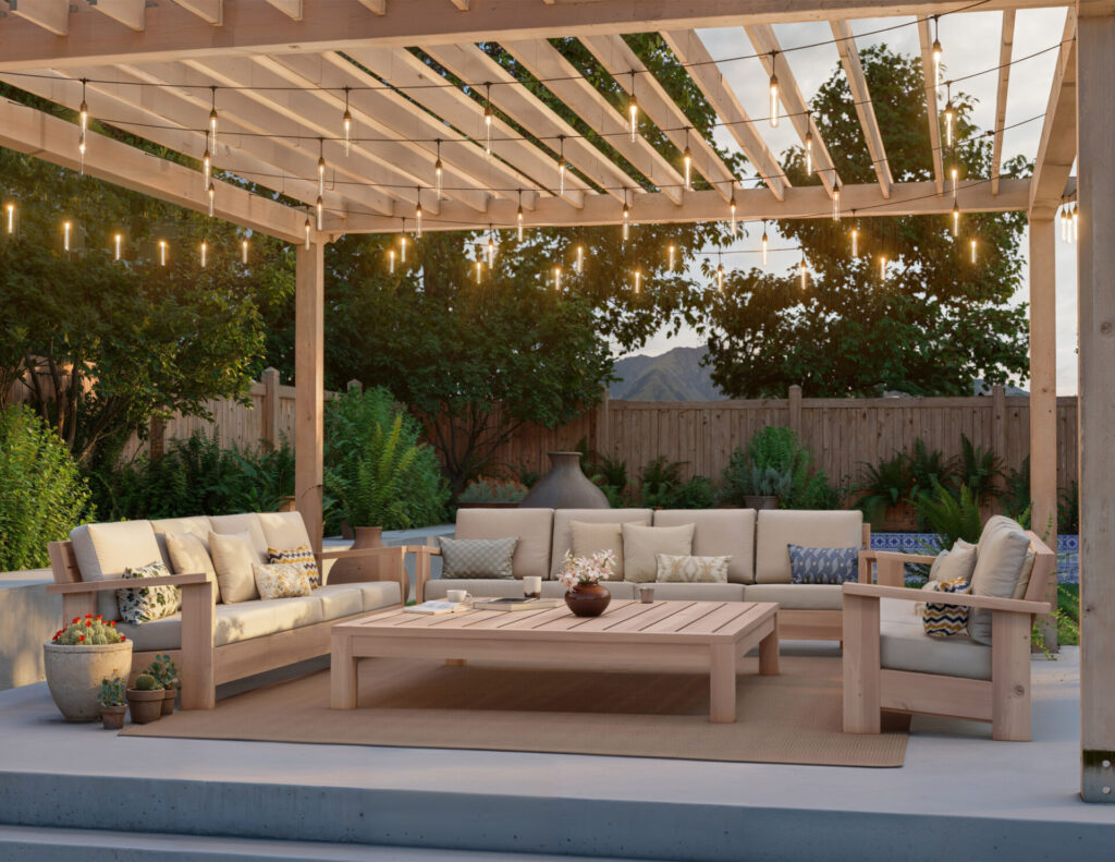 DIY wooden patio furniture set with comfortable cushions and spacious coffee table in a serene backyard setting.