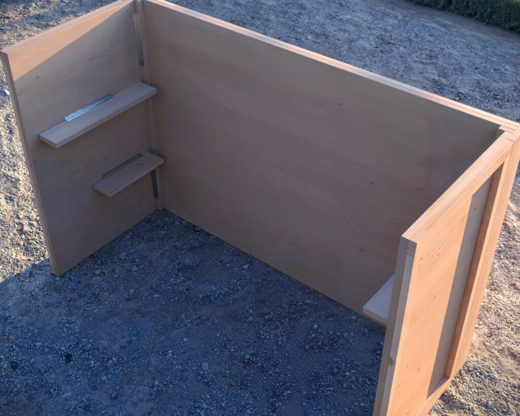 A beautifully crafted collapsible coffee bar with a wooden chevron pattern, featuring 'good vibes only' in white lettering, set up for an outdoor party with wine bottles, ice buckets, and glassware.