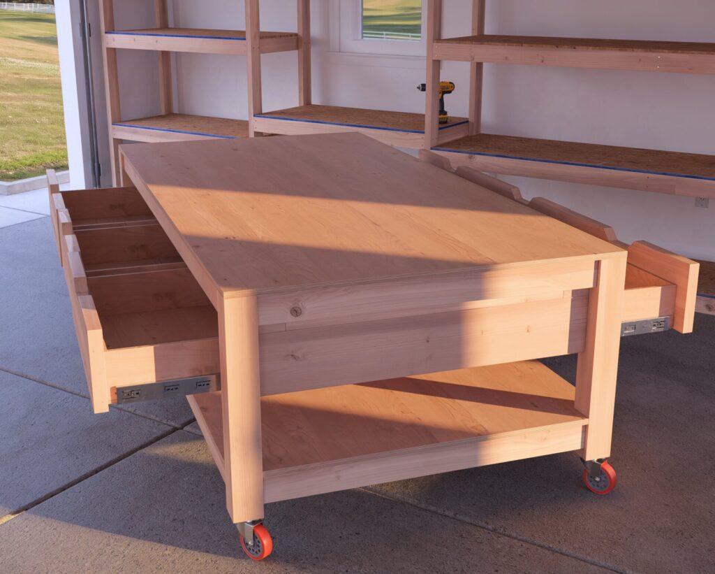 Custom-built DIY garage workbench with drawers and lumber storage in a well-organized garage.