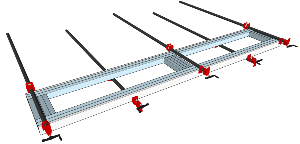 Gluing the table bench reinforcement boards using pipe clamps