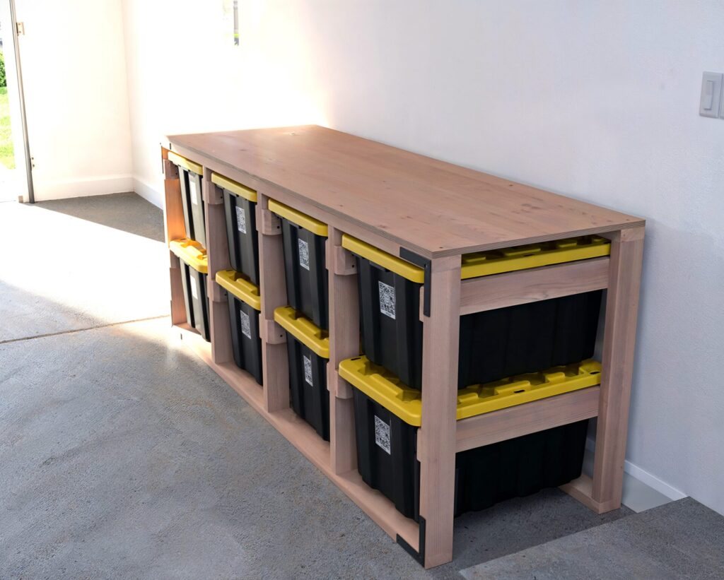 DIY 2x4 wooden storage rack for 27-gallon totes in a garage.