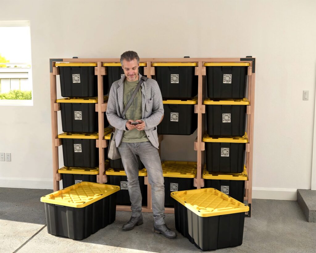 DIY 4x4 wooden storage rack for 27-gallon totes in a garage.