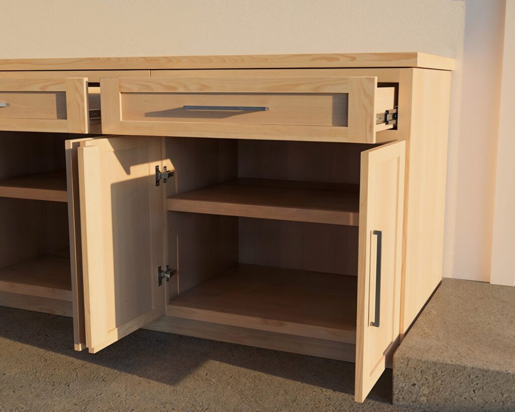 DIY cabinet counter made from 3/4 inch plywood with a wide top drawer and two cabinet doors, ideal for kitchen or garage setups.