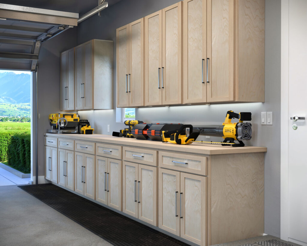 DIY garage wall and base cabinets designed for efficient storage, workspace organization, and tool accessibility.