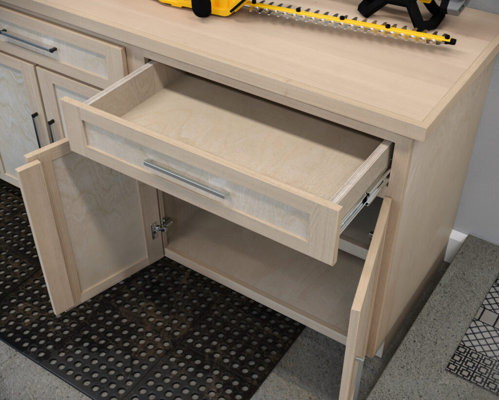 DIY garage wall and base cabinets designed for efficient storage, workspace organization, and tool accessibility.