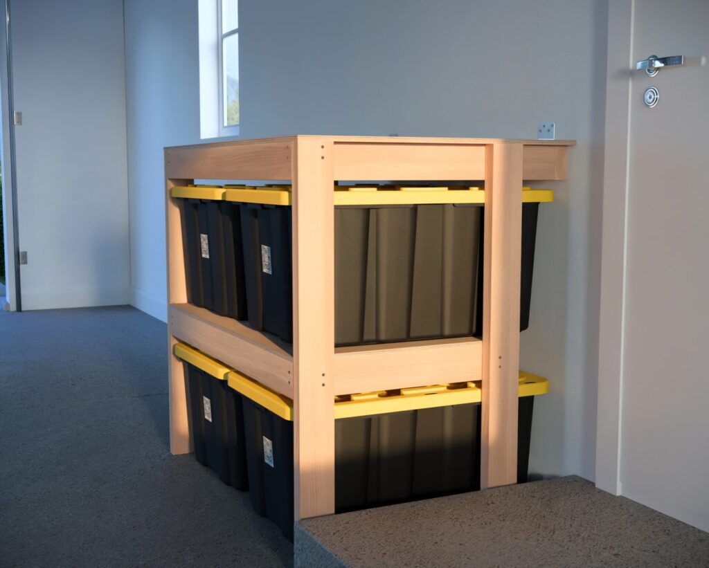 DIY garage shelving unit built with 2x4 lumber and plywood, designed to hold 27-gallon storage totes efficiently. The shelving features customizable configurations, making it a beginner-friendly and cost-effective storage solution for garages.